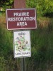 Prairie Restoration Area sign by UMSL wetland and prairie-to-be