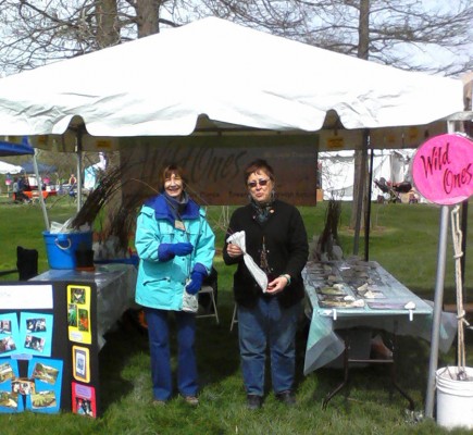 Wild Ones members with free seedlings at the 2013 Earth Day booth in Forest Park