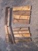 The lumber pieces include four posts, four top braces, four bottom braces, and (not shown) boards to lay across the top