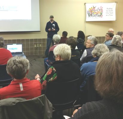 A man speaking to a group